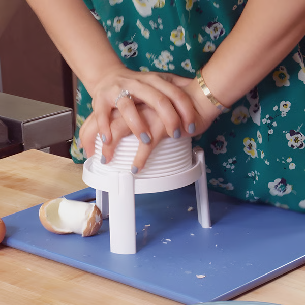 Boiled Egg Peeler with Press-Down Mechanism and Compact Design